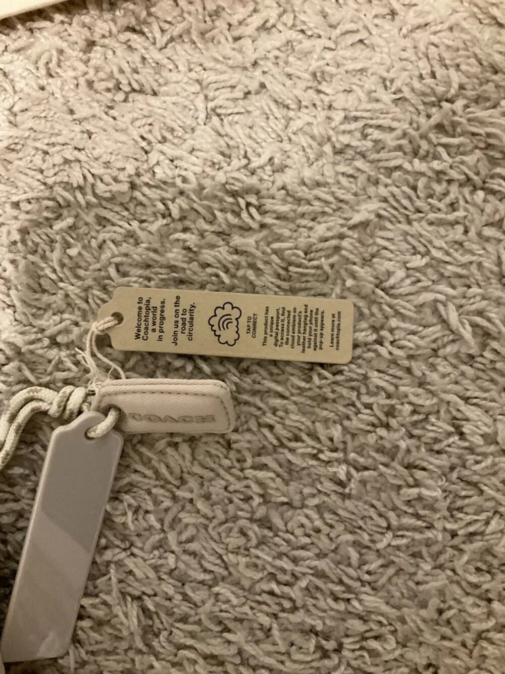 COACH coachtopia loop flat tote with cloud quilting. color: cloud cloud. Co668.